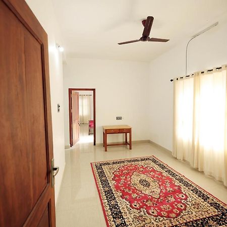 Daffodil Rooms - Non Ac Tellicherry Экстерьер фото