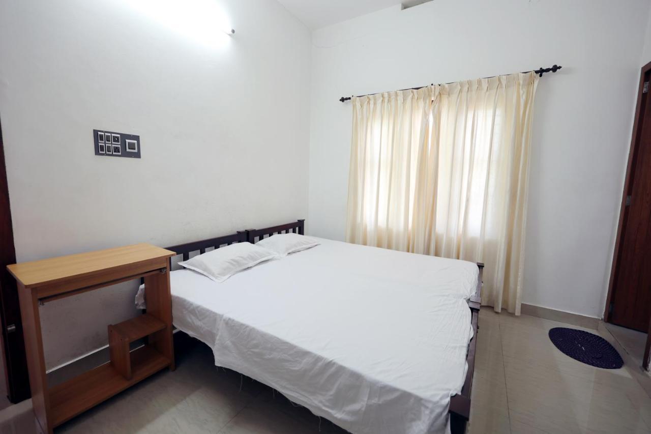 Daffodil Rooms - Non Ac Tellicherry Экстерьер фото