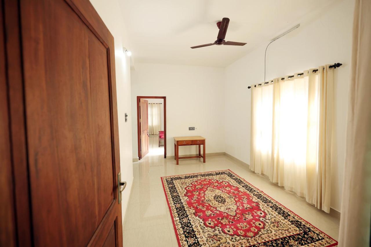 Daffodil Rooms - Non Ac Tellicherry Экстерьер фото